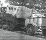 Газ-20 с груженым прицепом преодолевает подъем