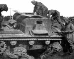 Немецкие солдаты осматривают тягач Т-26Т (с бронированным верхом)  Лето 1941